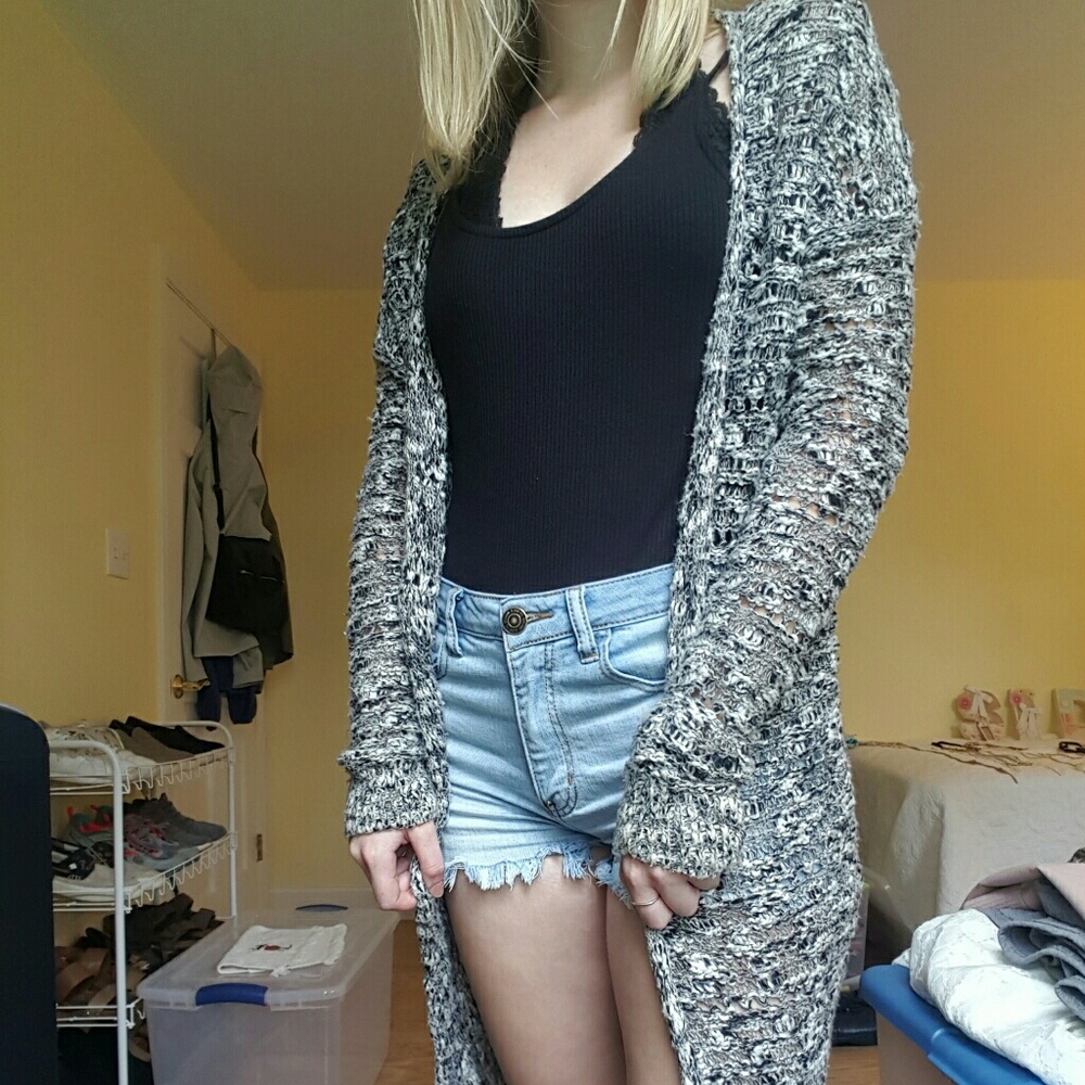 Floor length black and white crocheted sweater